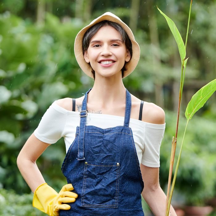 gardener-posing-with-flower-pot-2021-08-26-19-52-16-utc-1.jpg